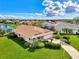 Single-Gathering home with a paved driveway and landscaping at 3270 Bay Ridge Way, Port Charlotte, FL 33953