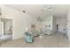 Open living room featuring light flooring and neutral color palette at 3270 Bay Ridge Way, Port Charlotte, FL 33953
