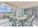 Covered patio with seating area and view of backyard at 3270 Bay Ridge Way, Port Charlotte, FL 33953