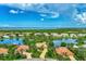 Bird's eye view of a beautiful home, situated in a tranquil waterfront community at 3479 Pennyroyal Rd, Port Charlotte, FL 33953