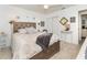 Elegant bedroom with a large bed and plenty of light at 5214 Norlander Dr, Port Charlotte, FL 33981