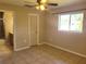 Bedroom with tile floors and a large window at 563 Verona St, Port Charlotte, FL 33948