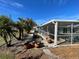 Landscaped backyard with mature plants and garden at 9 Annapolis Ln, Rotonda West, FL 33947