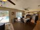 Dining area with pool view, table and chairs, and kitchen access at 9 Annapolis Ln, Rotonda West, FL 33947