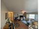 Bright living room with hardwood floors, a workspace, and comfortable seating at 9 Annapolis Ln, Rotonda West, FL 33947