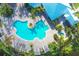 Aerial view of community pool and clubhouse at 10325 Longshore Rd # 17, Placida, FL 33946