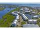 Aerial view of community and waterfront property at 10325 Longshore Rd # 17, Placida, FL 33946