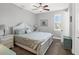 Cozy bedroom with a queen-size bed and ceiling fan at 10325 Longshore Rd # 17, Placida, FL 33946