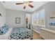 Guest bedroom with a full-size bed and built-in shelving at 10325 Longshore Rd # 17, Placida, FL 33946