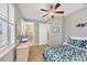 Bright bedroom with a full-size bed and access to a bathroom at 10325 Longshore Rd # 17, Placida, FL 33946