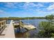 Community boardwalk and floating dock at 10325 Longshore Rd # 17, Placida, FL 33946