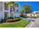Two-story townhome with attached garage and landscaping at 10325 Longshore Rd # 17, Placida, FL 33946