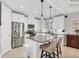 Modern kitchen with island and stainless steel appliances at 10325 Longshore Rd # 17, Placida, FL 33946