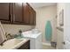 Well-appointed laundry room with washer, dryer, and ample cabinetry at 10325 Longshore Rd # 17, Placida, FL 33946