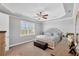 Relaxing main bedroom with a king-size bed and large window with plantation shutters at 10325 Longshore Rd # 17, Placida, FL 33946