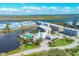 Aerial view of community with pool and waterways at 10325 Longshore Rd # 20, Placida, FL 33946