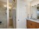 Bathroom with walk-in shower and modern vanity at 10325 Longshore Rd # 20, Placida, FL 33946