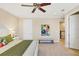 Second bedroom with king-size bed and access to a hallway at 10325 Longshore Rd # 20, Placida, FL 33946