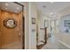 Interior view of a private elevator and hallway with hardwood floors at 10325 Longshore Rd # 20, Placida, FL 33946