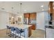 Modern kitchen with stainless steel appliances and a large island at 10325 Longshore Rd # 20, Placida, FL 33946