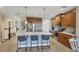 Modern kitchen with stainless steel appliances and a large island at 10325 Longshore Rd # 20, Placida, FL 33946