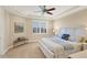 Spacious main bedroom with a king-size bed and large window at 10325 Longshore Rd # 20, Placida, FL 33946