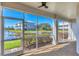 Screened-in porch with a view of the lake and community at 10325 Longshore Rd # 20, Placida, FL 33946