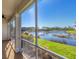 Peaceful screened porch overlooking a tranquil lake at 10325 Longshore Rd # 20, Placida, FL 33946