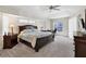 Main bedroom with a king-size bed and ample natural light at 10549 Washington Rd, Port Charlotte, FL 33981