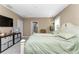 Comfortable main bedroom with en-suite bathroom access at 12753 Sagewood Dr, Venice, FL 34293