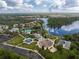 Community amenities including pool, playground, lake, and parking areas at 12753 Sagewood Dr, Venice, FL 34293