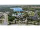 Community amenities including pool, clubhouse, lake, and parking areas at 12753 Sagewood Dr, Venice, FL 34293