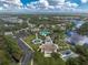 Community amenities including pool, playground, lake, and parking areas at 12753 Sagewood Dr, Venice, FL 34293