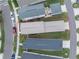 Overhead view of a house, highlighting its size and shape within the neighborhood at 12753 Sagewood Dr, Venice, FL 34293