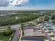 Aerial view of a house and surrounding neighborhood, showcasing the property's location and setting at 12753 Sagewood Dr, Venice, FL 34293