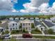 Aerial view of a two-story house in a quiet neighborhood at 12753 Sagewood Dr, Venice, FL 34293