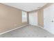 Spacious bedroom with neutral walls and carpet at 12753 Sagewood Dr, Venice, FL 34293