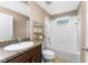 Bathroom with shower/tub combo and vanity at 12753 Sagewood Dr, Venice, FL 34293
