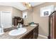 Elegant bathroom with double sinks and updated fixtures at 12753 Sagewood Dr, Venice, FL 34293