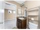 Bathroom with vanity and toilet at 12753 Sagewood Dr, Venice, FL 34293