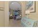 View through entryway to living room with light-colored furniture at 13384 Creekside Ln, Port Charlotte, FL 33953