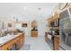 Clean and bright kitchen with granite countertops and stainless steel appliances at 13515 Keystone Blvd, Port Charlotte, FL 33981