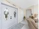 Bright entryway with double doors and a decorative rug at 13515 Keystone Blvd, Port Charlotte, FL 33981