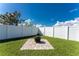 Private backyard with fire pit and sitting area at 13515 Keystone Blvd, Port Charlotte, FL 33981