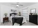 Guest bedroom with a full-size bed, dresser, and window coverings at 13515 Keystone Blvd, Port Charlotte, FL 33981