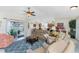 Open living room with ample seating and access to the lanai at 13515 Keystone Blvd, Port Charlotte, FL 33981