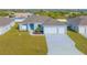 Newly built home with two-car garage and landscaped yard at 14304 Amestoy Ave, Port Charlotte, FL 33981