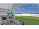 Covered patio furniture with a view of the backyard at 14304 Amestoy Ave, Port Charlotte, FL 33981