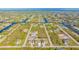 Aerial view of a new three-unit home development at 14304 Amestoy Ave, Port Charlotte, FL 33981