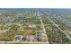 Aerial view showcasing a new three-unit home development at 14304 Amestoy Ave, Port Charlotte, FL 33981
